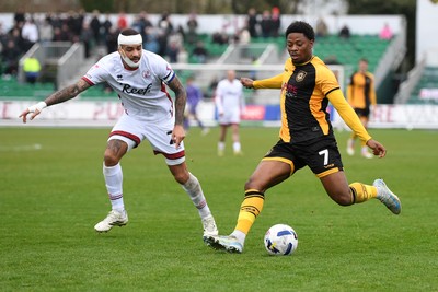 030426 - Newport County v Crawley Town - Sky Bet League 2 - Bobby Kamwa of Newport County is challenged by Jay Williams of Crawley 