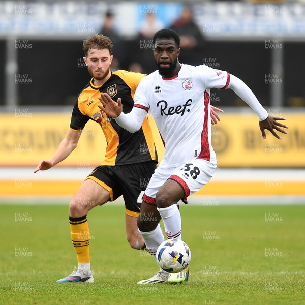 030426 - Newport County v Crawley Town - Sky Bet League 2 - Matthew Baker of Newport County is challenged by Tobi Adeyemo of Crawley