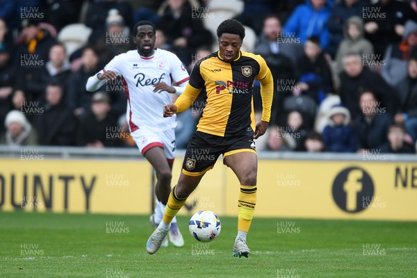 030426 - Newport County v Crawley Town - Sky Bet League 2 - Bobby Kamwa of Newport County is challenged by Ade Adeyemo of Crawley