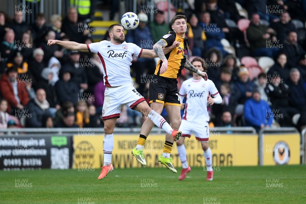 030426 - Newport County v Crawley Town - Sky Bet League 2 - James Crole of Newport County is challenged by Charlie Barker of Crawley