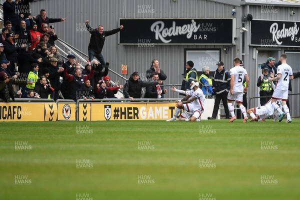 030426 - Newport County v Crawley Town - Sky Bet League 2 - Crawley fans celebrate after their side score a second goal