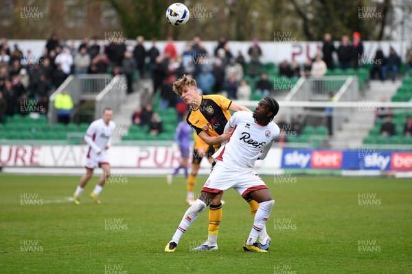 030426 - Newport County v Crawley Town - Sky Bet League 2 - Tom Davies of Newport County is challenged by Akinwale Odimayo of Crawley