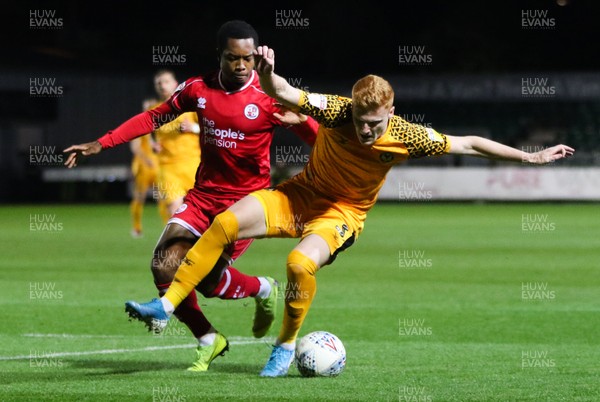 221019 - Newport County v Crawley Town, Sky Bet League 2 - Ryan Haynes of Newport County is challenged by Ashley Nathaniel-George of Crawley Town