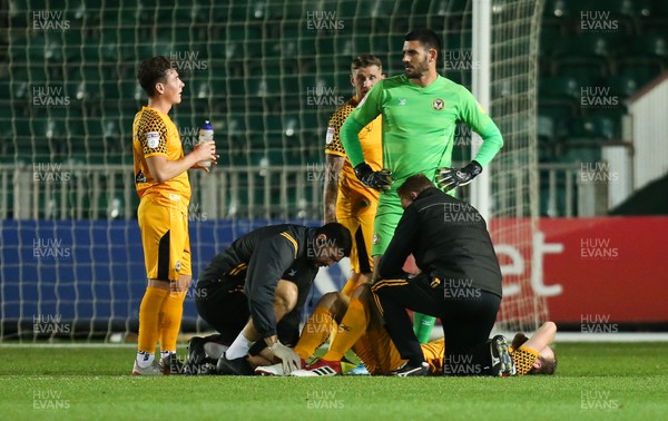 221019 - Newport County v Crawley Town, Sky Bet League 2 - Mark O'Brien of Newport County receives treatment on the pitch
