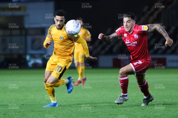 221019 - Newport County v Crawley Town, Sky Bet League 2 - Corey Whiteley of Newport County and Reece Grego-Cox of Crawley Town compete for the ball