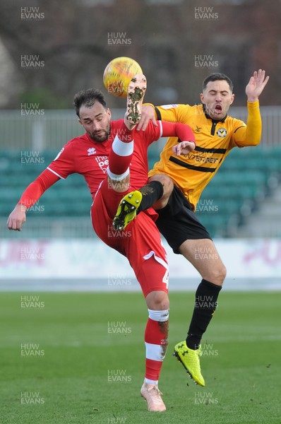 291218 - Newport County v Crawley Town - Sky Bet League 2 -  Robbie Willmott of Newport County and Josh Payne of Crawley Town compete for the ball