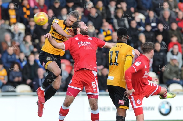 291218 - Newport County v Crawley Town - Sky Bet League 2 -  Fraser Franks of Newport County beats Joe McNerney of Crawley Town to the header