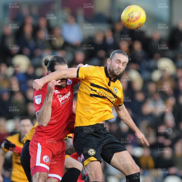 291218 - Newport County v Crawley Town - Sky Bet League 2 -  Fraser Franks of Newport County wins the header 