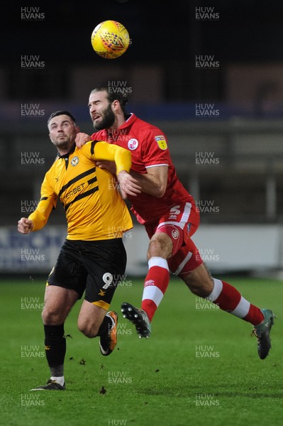 291218 - Newport County v Crawley Town - Sky Bet League 2 -  Padraig Amond of Newport County and Joe McNerney of Crawley Town compete for the ball 