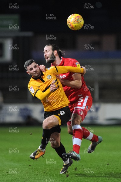 291218 - Newport County v Crawley Town - Sky Bet League 2 -  Padraig Amond of Newport County and Joe McNerney of Crawley Town compete for the ball 