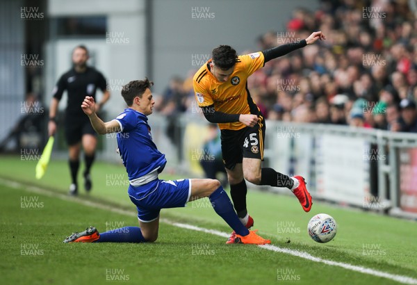 240318 - Newport County v Crewe Alexandra, Sky Bet League 2 - Aaron Collins of Newport County is tackled by Perry Ng of Crewe Alexandra