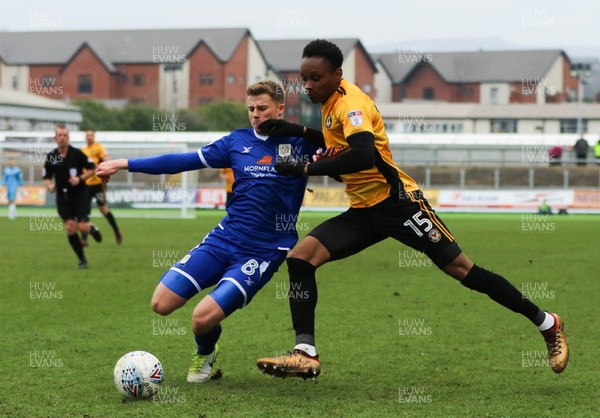 240318 - Newport County v Crewe Alexandra, Sky Bet League 2 - Shawn McCoulsky of Newport County is tackled by James Jones of Crewe Alexandra