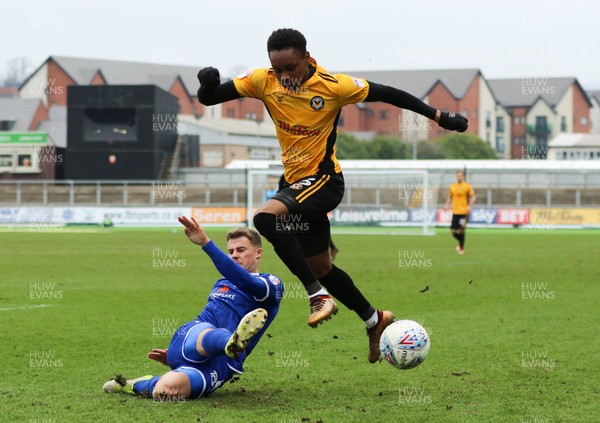 240318 - Newport County v Crewe Alexandra, Sky Bet League 2 - Shawn McCoulsky of Newport County is tackled by James Jones of Crewe Alexandra