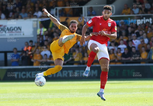 240819 - Newport County v Crewe Alexandra, Sky Bet League 2 - Corey Whiteley of Newport County lines up a spectacular shot at goal as Daniel Powell of Crewe Alexandra challenges
