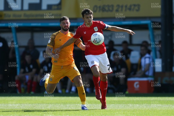 240819 - Newport County v Crewe Alexandra, Sky Bet League 2 - Padraig Amond of Newport County and Perry Ng of Crewe Alexandra compete for the ball