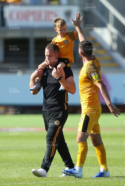 240819 - Newport County v Crewe Alexandra, Sky Bet League 2 - Goalscorer Padraig Amond of Newport County celebrates with Newport County manager Michael Flynn and his son at the end of the match