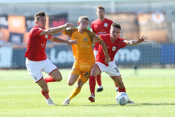 240819 - Newport County v Crewe Alexandra, Sky Bet League 2 - Taylor Maloney of Newport County charges at the Crewe defence