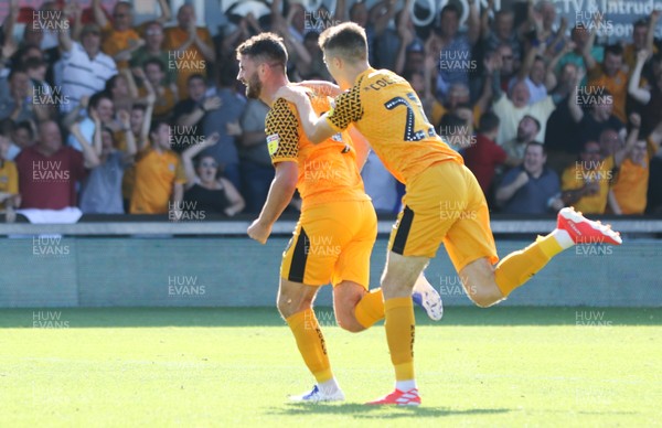 240819 - Newport County v Crewe Alexandra, Sky Bet League 2 - Padraig Amond of Newport County, left, wheels away to celebrate with Lewis Collins of Newport County after scoring the winning goal
