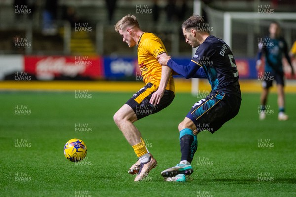 291223 - Newport County v Crewe Alexandra - Sky Bet League 2 - Will Evans of Newport County is tackled by Mickey Demetriou of Crewe Alexandra