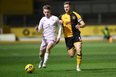 291225 - Newport County v Crewe Alexandra - Sky Bet League 2 - James Clarke of Newport County is challenged by Owen Lunt of Crewe