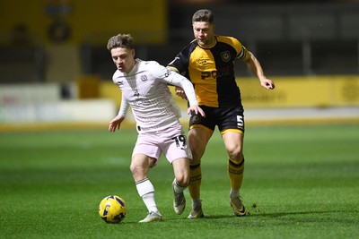 291225 - Newport County v Crewe Alexandra - Sky Bet League 2 - James Clarke of Newport County is challenged by Owen Lunt of Crewe