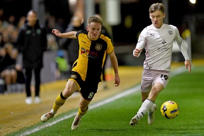 291225 - Newport County v Crewe Alexandra - Sky Bet League 2 - Matt Smith of Newport County is challenged by Owen Lunt of Crewe