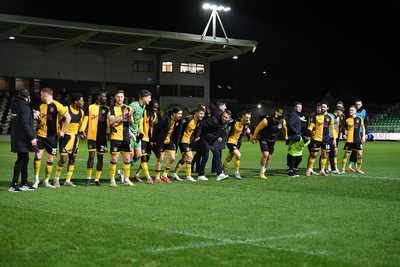 291225 - Newport County v Crewe Alexandra - Sky Bet League 2 - Newport County players and staff celebrate with the fans at full time