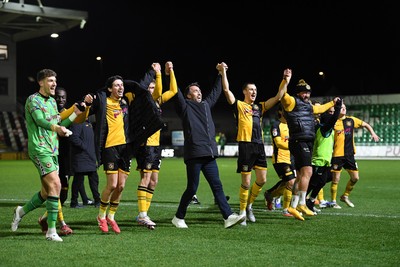 291225 - Newport County v Crewe Alexandra - Sky Bet League 2 - Newport County players and staff celebrate with the fans at full time