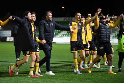 291225 - Newport County v Crewe Alexandra - Sky Bet League 2 - Newport County players and staff celebrate with the fans at full time