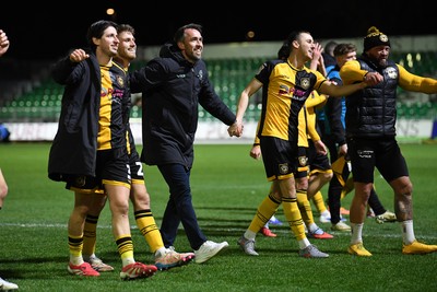 291225 - Newport County v Crewe Alexandra - Sky Bet League 2 - Newport County players and staff celebrate with the fans at full time