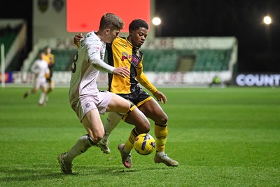 291225 - Newport County v Crewe Alexandra - Sky Bet League 2 - Bobby Kamwa of Newport County is challenged by James Connolly of Crewe