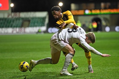 291225 - Newport County v Crewe Alexandra - Sky Bet League 2 - Bobby Kamwa of Newport County is challenged by James Connolly of Crewe