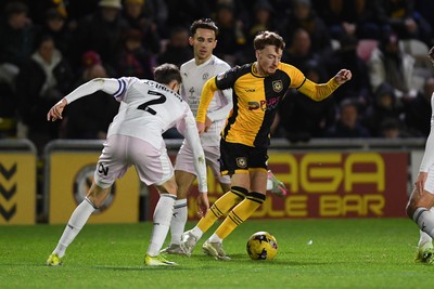 291225 - Newport County v Crewe Alexandra - Sky Bet League 2 - Michael Spellman of Newport County is challenged by Lewis Billington of Crewe