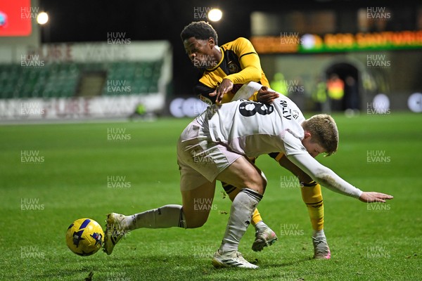 291225 - Newport County v Crewe Alexandra - Sky Bet League 2 - Bobby Kamwa of Newport County is challenged by James Connolly of Crewe