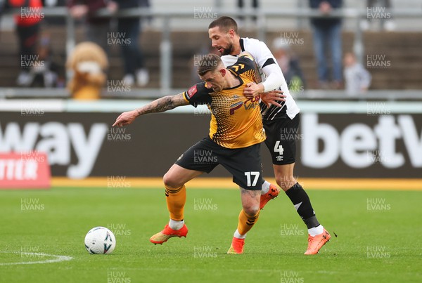 271122 - Newport County v Derby County, Emirates FA Cup, 2nd Round - Scot Bennett of Newport County is challenged by Conor Hourihane of Derby County