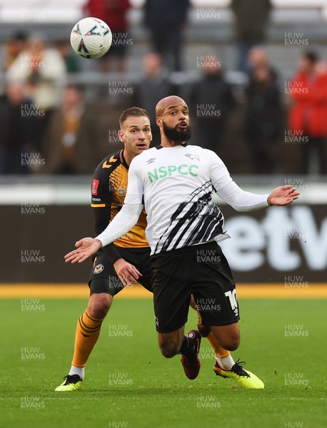 271122 - Newport County v Derby County, Emirates FA Cup, 2nd Round - David McGoldrick of Derby County controls the ball as Mickey Demetriou of Newport County challenges