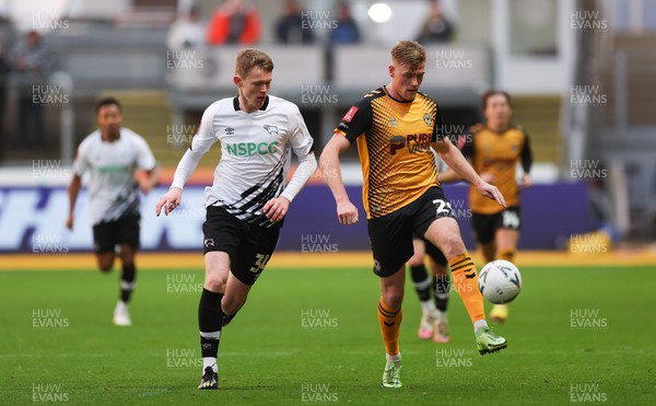 271122 - Newport County v Derby County, Emirates FA Cup, 2nd Round - Will Evans of Newport County and Jake Rooney of Derby County compete for the ball