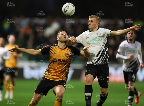 271122 - Newport County v Derby County, Emirates FA Cup, 2nd Round - Cameron Norman of Newport County and Louie Sibley of Derby County compete for the ball