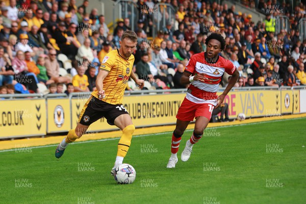 120823 - Newport County v Doncaster Rovers - Sky Bet League 2 - Shane McLoughlin of Newport County whips in a cross