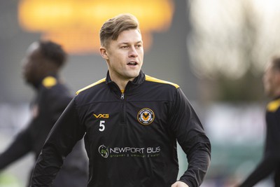 060124 - Newport County v Eastleigh - FA Cup Third Round - James Clarke of Newport County during the warm up