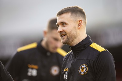 060124 - Newport County v Eastleigh - FA Cup Third Round - Shane McLoughlin of Newport County during the warm up