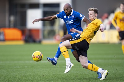 060124 - Newport County v Eastleigh - FA Cup Third Round - Harry Charsley of Newport County in action against Nigel Atangana of Eastleigh