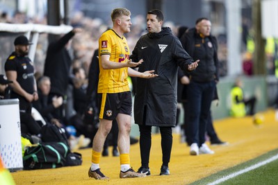 060124 - Newport County v Eastleigh - FA Cup Third Round - Will Evans of Newport County waits to return to the pitch 