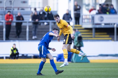 060124 - Newport County v Eastleigh - FA Cup Third Round - Ryan Delaney of Newport County wins a header