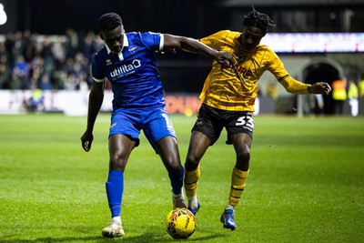 060124 - Newport County v Eastleigh - FA Cup Third Round - Matty Bondswell of Newport County in action against Enzio Boldewijn of Eastleigh