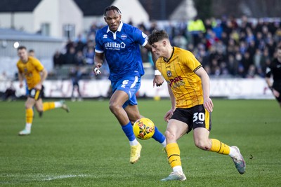 060124 - Newport County v Eastleigh - FA Cup Third Round - Seb Palmer-Houlden of Newport County in action against Ludwig Francillette of Eastleigh