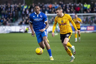 060124 - Newport County v Eastleigh - FA Cup Third Round - Shane McLoughlin of Newport County in action against Ludwig Francillette of Eastleigh