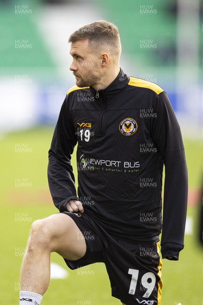 060124 - Newport County v Eastleigh - FA Cup Third Round - Shane McLoughlin of Newport County during the warm up