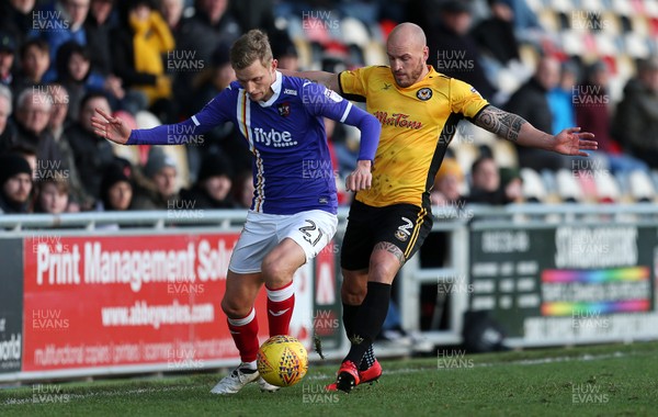 010118 - Newport Count v Exeter City - SkyBet League Two - Dean Moxey of Exeter City is challenged by David Pipe of Newport County