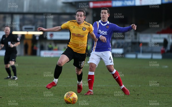 010118 - Newport Count v Exeter City - SkyBet League Two - Matthew Dolan of Newport County is challenged by Lloyd James of Exeter City
